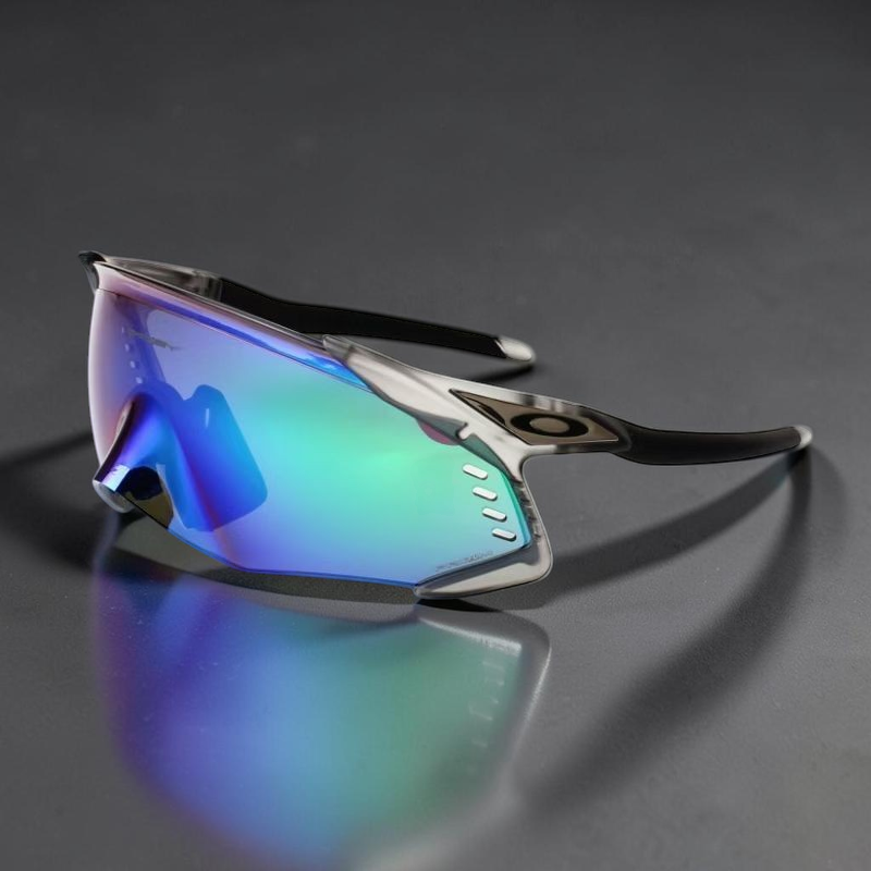 Gafas de sol deportivas OakGlasses Kato Velo con lente envolvente azul iridiscente y montura gris translúcida